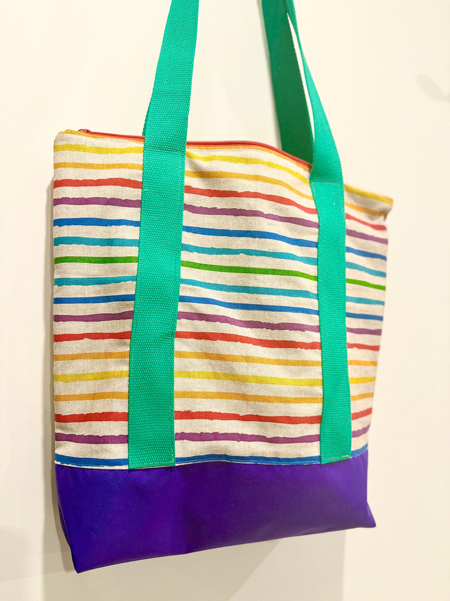 waterproof base, cotton canvas straps, lined shoulder bag with zip and inner pockets - perfect present for fans of rainbows and LGBTQ+ allies
