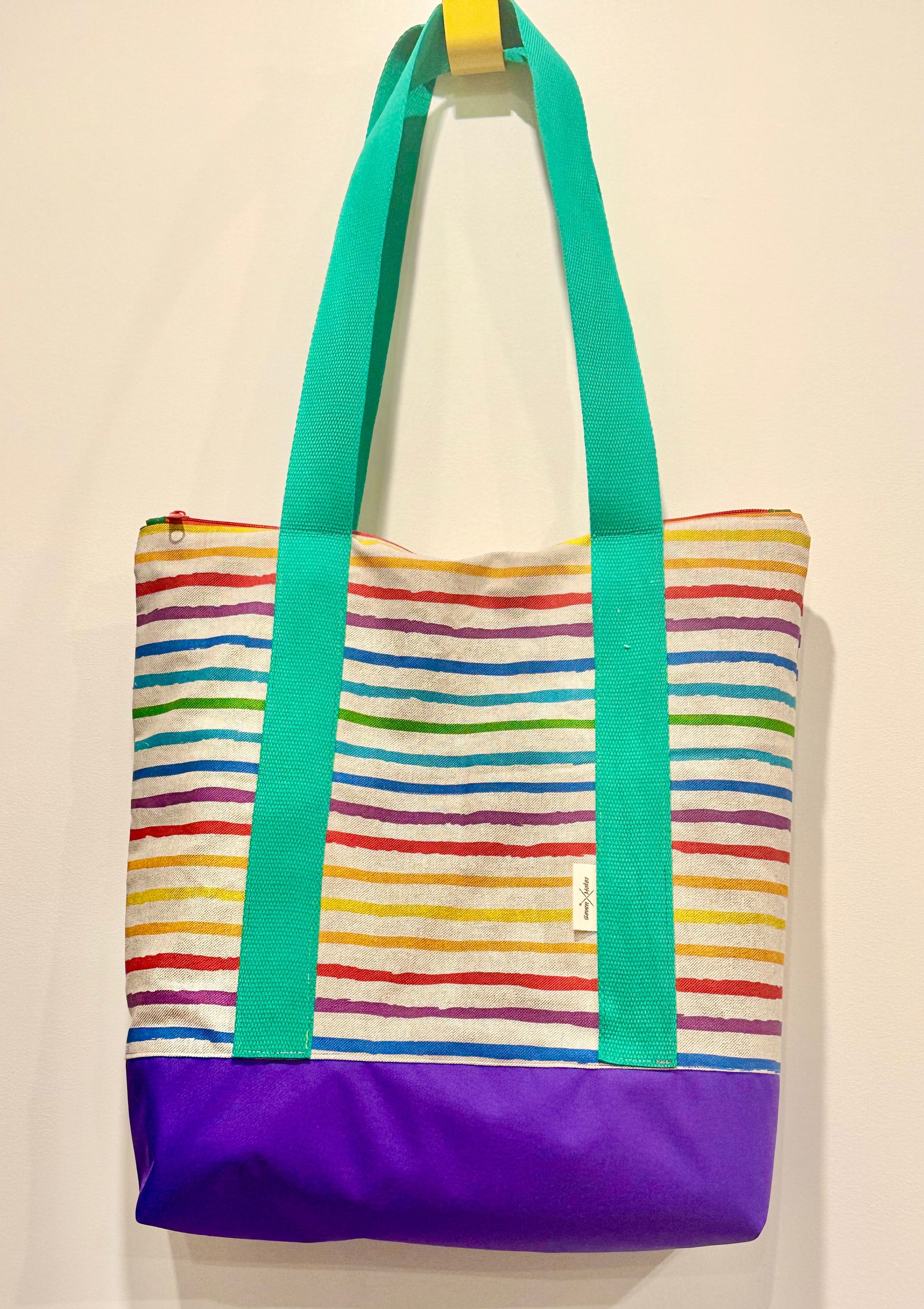 waterproof base, cotton canvas straps, lined shoulder bag with zip and inner pockets - perfect present for fans of rainbows and LGBTQ+ allies