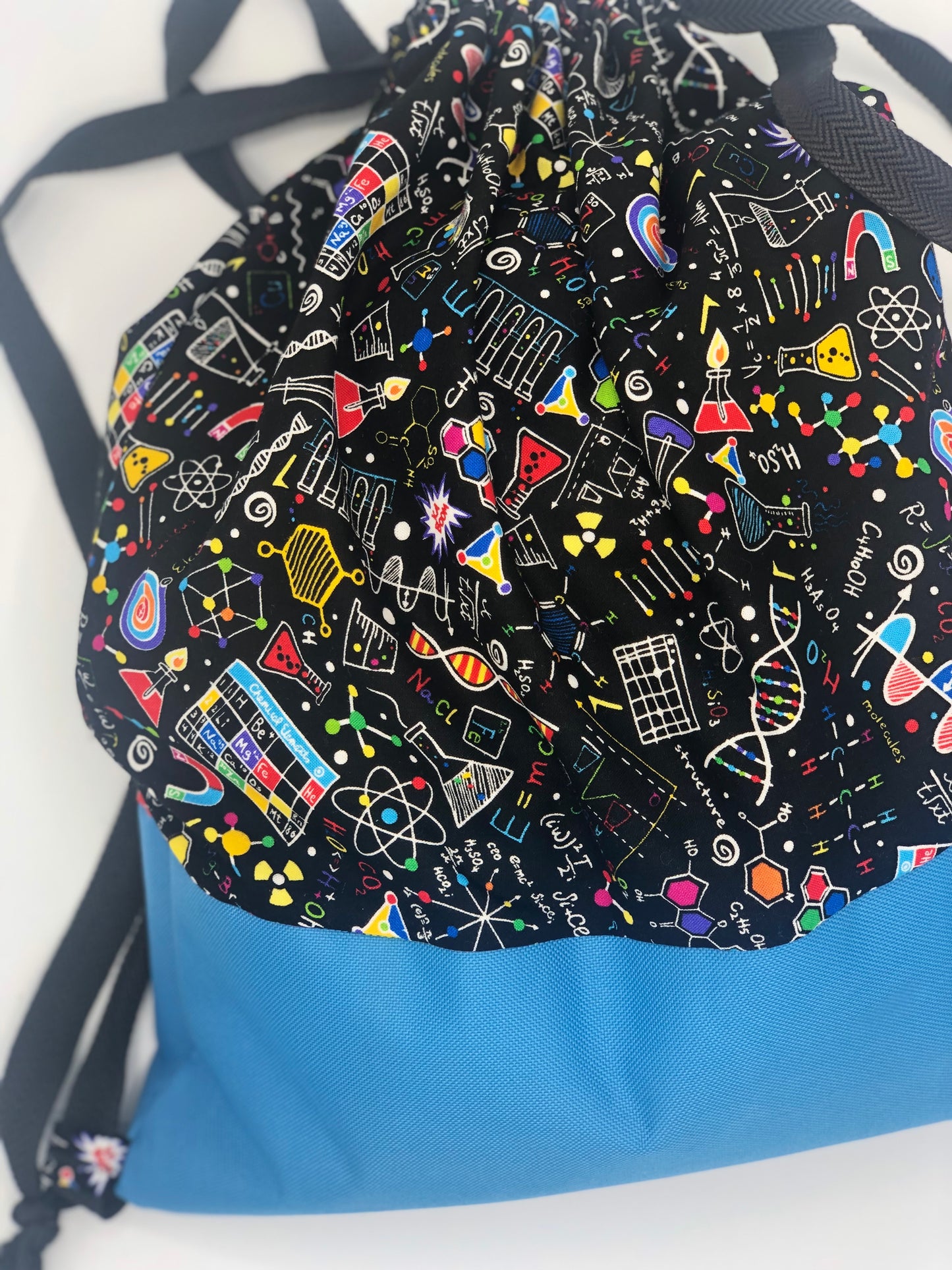 Backpack style bag - cool science fabric with waterproof bottom